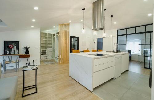 Lugo Apartment | Ático Isabel, diseño y calidez junto a la Muralla Romana