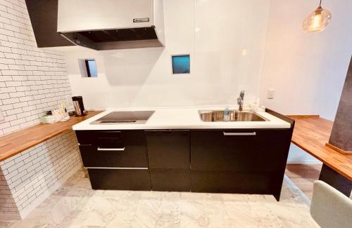 Ainan-cho House | 波止場の海まで徒歩30秒の貸切宿 "ギョグンミニ" "Gyogun Mini"