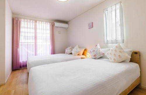 Nagawa Apartment | 那覇空港から15分DMM水族館とイーアス豊崎近く最大10名oKの南部リゾート宿OKS inn