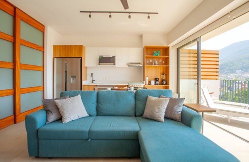 El Caloso Condo | 1 Bedroom Condo with River & Partial Ocean View in Luxury New Building!