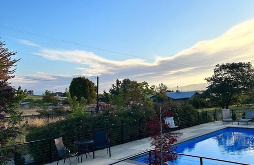 Medford Apartment | 1 bedroom with a king-size bed, one bathroom, and kitchenette.