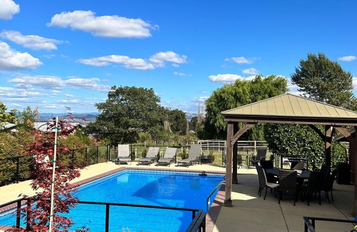 Medford Apartment | 1 bedroom with a king-size bed, one bathroom, and kitchenette.