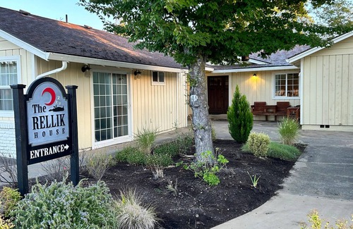 Medford Apartment | 1 bedroom with a king-size bed, one bathroom, and kitchenette.