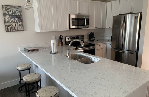 Gypsum Condo | 1 of 4 Waterfront Rental Units - Clean, Safe & Small Complex Sleeps 8-32