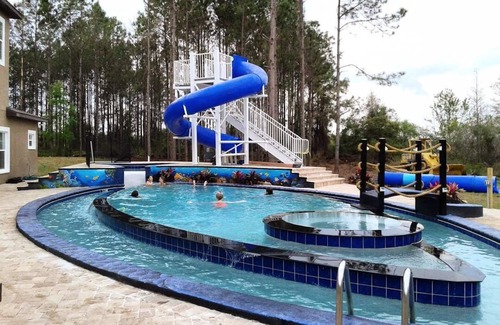 Clermont House | 10 Acre Lakefront Mansion Sleeps Up to 45 - Waterslide & Lazy River