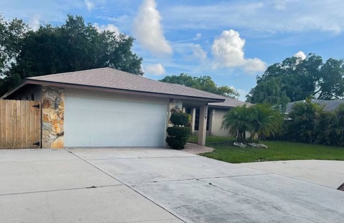 South Gate Ridge House | 10 minutes to siesta key beach! Hot tub an pool heated two master bedrooms!