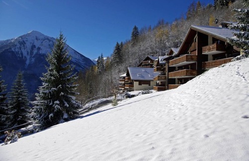 Champagny-en-Vanoise Apartment | 100m from ski slopes, 2nd floor, balcony, fireplace or stove, tv, ski locker, 55m²