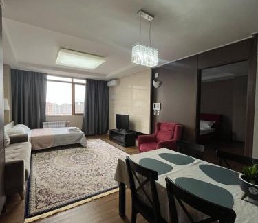 Almaty District Apartment | 12 эт Хайвилл 2х комн кв с шикарным видом на Мечеть Хазрет Султан на 1-6 гостей