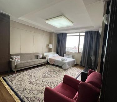 Almaty District Apartment | 12 эт Хайвилл 2х комн кв с шикарным видом на Мечеть Хазрет Султан на 1-6 гостей
