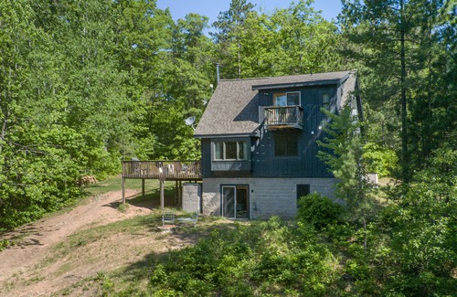 Conover Cabin | 14 acres of seclusion on private lake, right off Snowmobile and ATV trails.