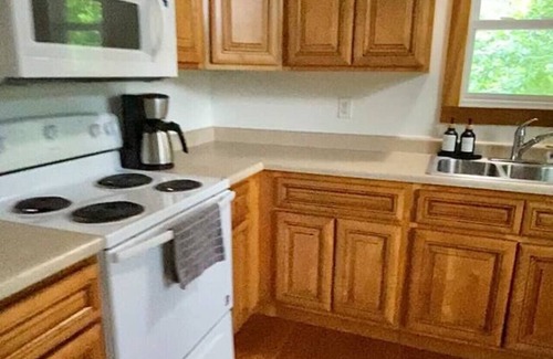 Rogers Apartment | 14 Guest, 7 Bed, 4 BR, Lakefront Cabin w/Hot Tub