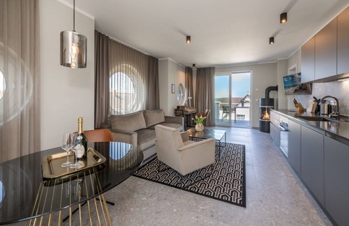 Lubmin Apartment | 150m to the beach! Modern 60m² sea view apartment: balcony & fireplace, for 4 pers.