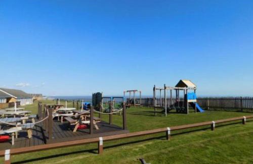 Corton House | 18, Waterside park, Fernly Holiday Home