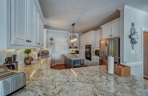Belmont House | 180 degree lake view, 300 ft. of shoreline, heated pool, and private beach.