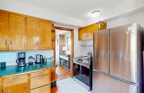 West End House | 1940s cottage with oak flooring, grill, hammock, & water views - dog-friendly