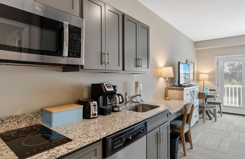 Southport Condo | 1BR/1BA Hotel Room - Pool, Elevator, Sleeps 4