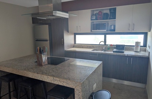 Ejidal Condo | 2 BDR Penthouse has PRIVATE ROOFTOP with Jacuzzi!