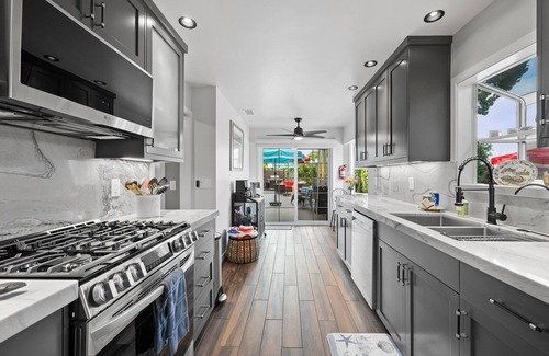 South Oceanside House | 2 Beautiful Coastal Homes FAMILY FRIENDLY: Outdoor Space: FireTable BBQ Yard EVC