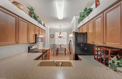 Naples Condo | 2 bedroom 2 bath Terrace Condo with Lanai, Pools, Golf Club, Tennis Club & more