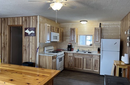 Au Train Cabin | 2 bedroom cabin on beautiful lakefront property with an outdoor hot tub