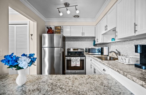 Cocoa Beach Condo | 2 Bedroom Condo with Private Beach+Heated Pool
