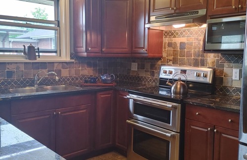 Norseman Heights House | 2 Bedroom pet friendly house with garden close to transit.