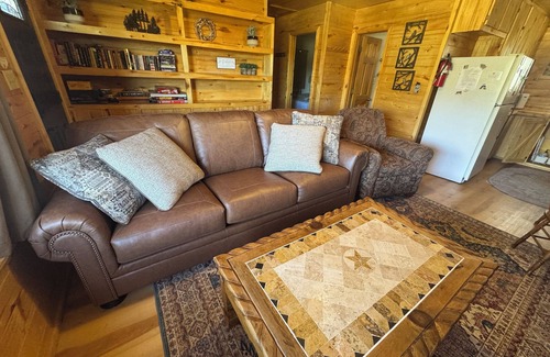 Greer Cabin | 2 BR-1BA Log Cabin on Main Street. Stocked trout pond, porch, dogs ok.
