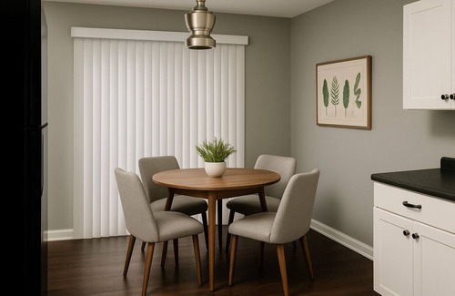 Michigan City House | 🛏 2 cozy bedrooms (1 King & 1 Queen) and 1 bathroom 🍳 Spacious kitchen stocked for cooking and dining in 🛋 Large living room for lounging after a long day. 🚗 Garage parking and easy access to town 🐶 Dog Friendly with Fully Fenced Ya