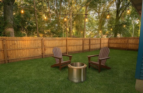 Michigan City House | 🛏 2 cozy bedrooms (1 King & 1 Queen) and 1 bathroom 🍳 Spacious kitchen stocked for cooking and dining in 🛋 Large living room for lounging after a long day. 🚗 Garage parking and easy access to town 🐶 Dog Friendly with Fully Fenced Ya