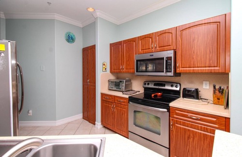 North Naples Condo | 2 PLUS DEN2 BATH CONDO IN BARBADOS AT TARPON COVE, 1ST FLOOR, SEASONAL