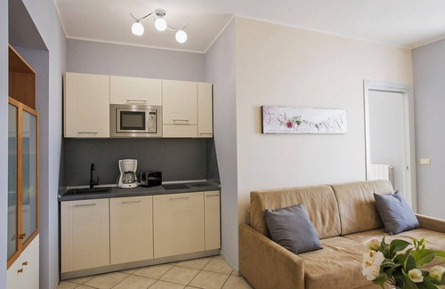 Carciano Apartment | 2-room apartment with small balcony in an Art Nouveau villa with communal pool