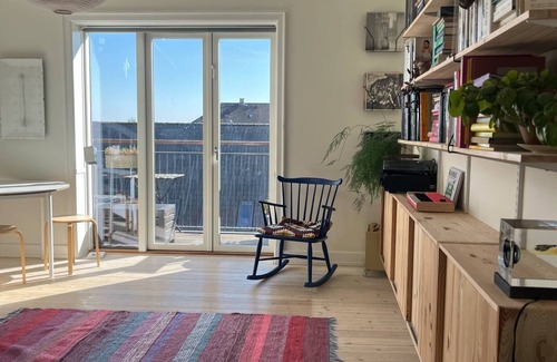 Vesterbro Condo | 2-storey family apartment with lots of light, views and proximity to city and nature