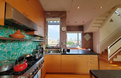 SoHo Apartment | 2 story Penthouse with incredible light, 26' ceilings & great outdoor space