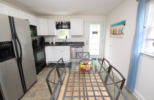Rehoboth Beach House | 22740 W. Holly Way is located on a tributary of the Rehoboth Bay in a gated community!