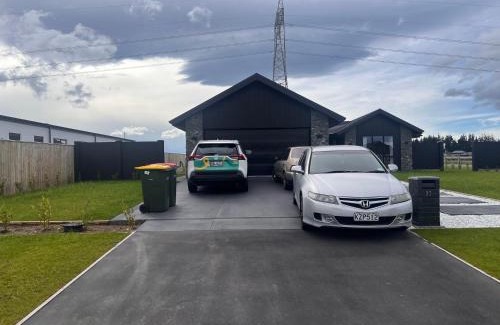 West Melton House | 23 Texel Crescent Black brick house
