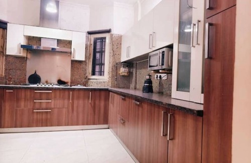 Nehru Place Apartment | 2BHK- GK1 M Block Market by HostMyStay