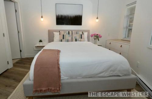 Village North Apartment | 2BR 2BA Whistler Escape with Newly Renovated Hot Tub, Steps from Olympic Rings Shops and Cafes - Relax in Comfort and Enjoy the Perfect Getaway in the Heart of the Village