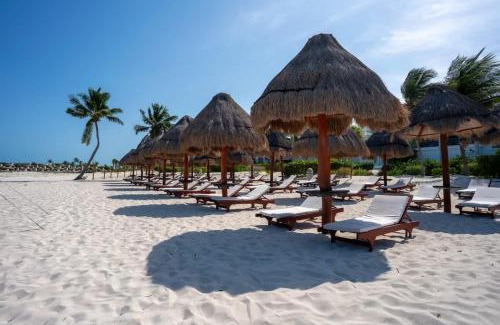 Playa Mujeres Apartment | 2BR Beach & Marina front Condo w/Top Features