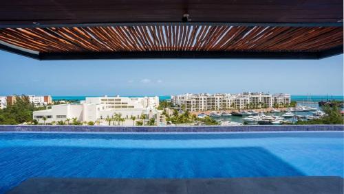 Playa Mujeres Apartment | 2BR Beach & Marina front Condo w/Top Features