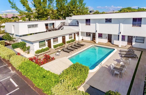 Deerfield Beach Apartment | 2BR Beach Walk 205 | Pool View | Sleeps up to 6