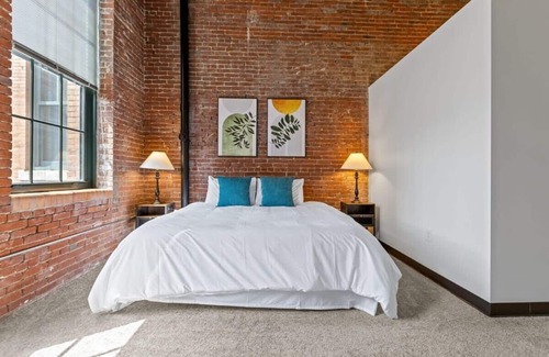 Strip District Apartment | 2BR Historic Loft Oasis With Pool & Gym
