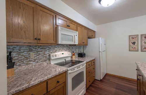 Baileys Harbor Condo | 2BR Lakefront Condo: Balcony, Hot Tub, & Fireplace