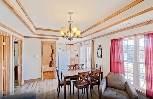 Indian Point Condo | 2BR Waterfront Duplex Cabin w/Pool + Swim & Boat dock