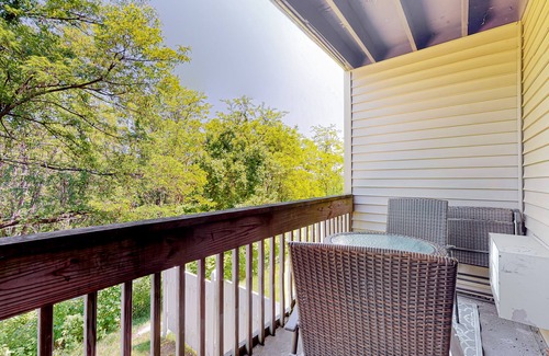Weirs Beach Condo | 2nd-Floor condo with a private balcony, on-site beach, outdoor pool, laundry
