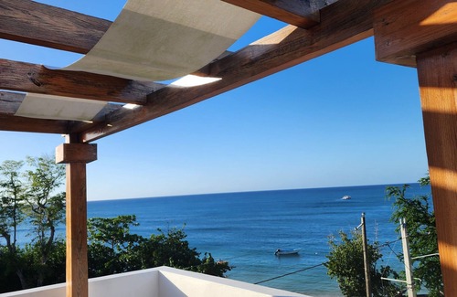 North Coast Condo | 3 bd condo with rooftop across the street from beach!
