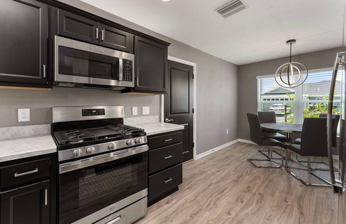 Wildwood House | 3 Bed 2 Bathroom Home in DeLuna with golf cart.