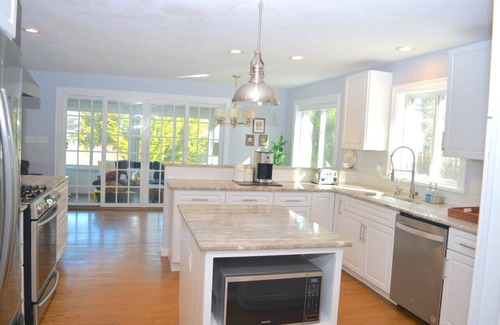 North Falmouth House | 3 bedroom 2 bath Renovated Ranch with Pond Views on peaceful private 1.5 acre lot in North Falmouth