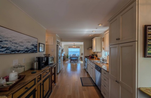 North Kingstown House | 3 bedroom, 2 full bathroom water view and ocean front property. Outdoor kitchen and lounge chairs.