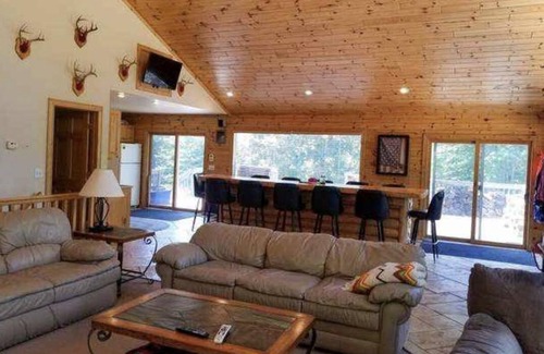 Harrison Cabin | 3-Bedroom Cabin Nestled in the Woods on a Pond! Sleeps 16-20 - ORV Trail access.