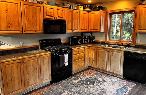 Harrison Cabin | 3-Bedroom Cabin Nestled in the Woods on a Pond! Sleeps 16-20 - ORV Trail access.